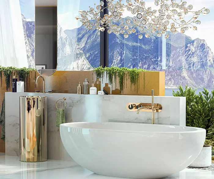 freistehende Badewanne in weiß-goldenem Bad mit Ausblick auf Berge